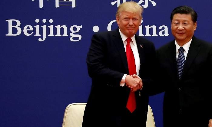 donald-trump-xi-jinping-cogiendose-mano-eeuu-china-reuters-770x420.jpg