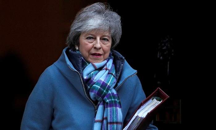 theresa-may-brexit-reino-unido-carpeta-reuters.jpg