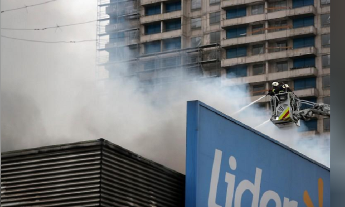 protestas.chile.incendio.supermercado.reuters.png