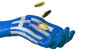 grecia-mano-monedas-getty.jpg