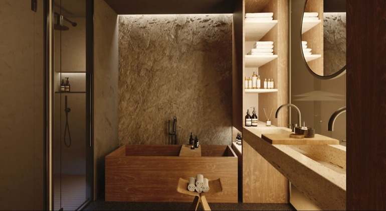 Baño hecho digital con una bañera de remates de madera y un espejoº