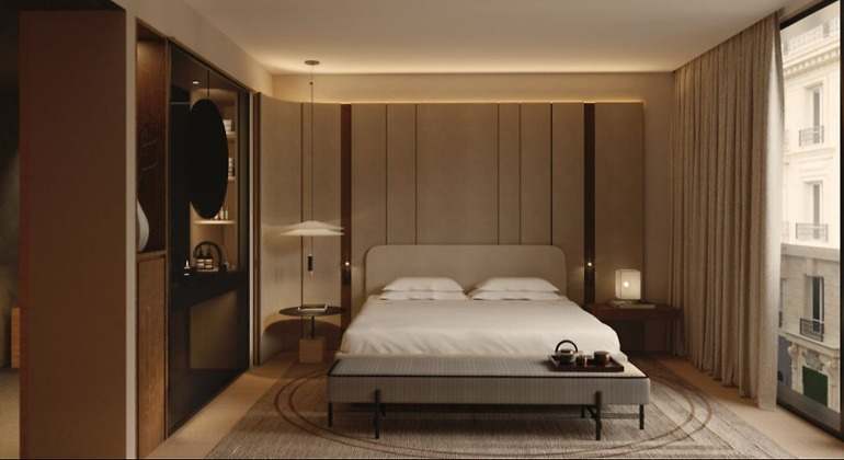Habitación del hotel de Nobu hecho de manera digital con una cama y una mesilla