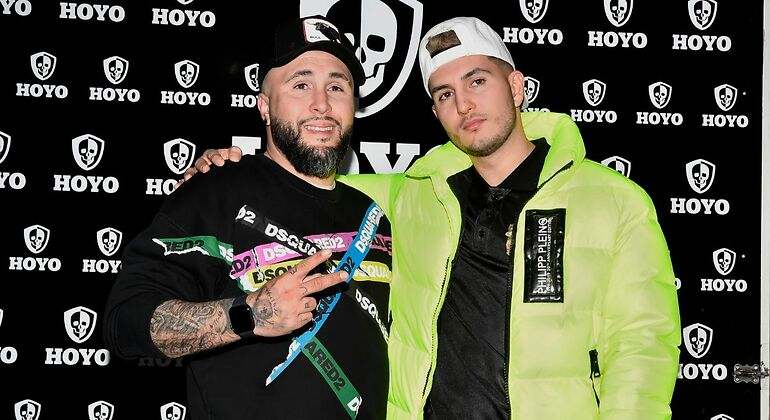 Omar Montes y Kiko Rivera en un evento en Sevilla